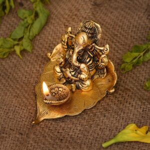 Ganesh Idol on Leaf - Lord Ganesha with Diya - Metal Diya for Diwali Decoration | eBay