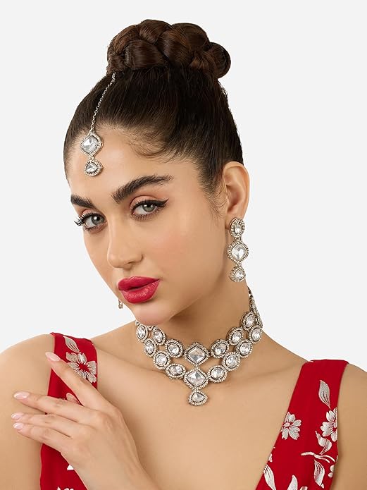 Poojavi Silver Tone Dazzling Stones Embellished Choker Necklace Earring & Maangtikka Set For Women