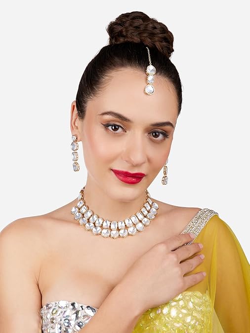 Poojavi Gold Tone Dazzling Stones Choker Necklace Earring Maangtikka Set For Women